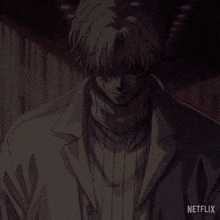 a close up of a person 's face with the word netflix on the bottom right