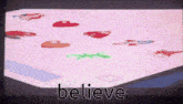 the word believe is on a screen with a cartoon