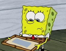 a cartoon character named spongebob is holding a piece of paper