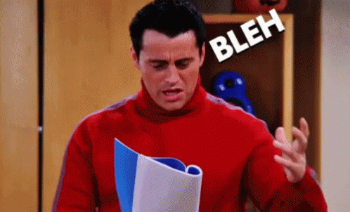 Joey from Friends in a red turtleneck looks at a script and says "bloo blah de blah blay"