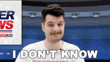 a man with a mustache says " i don 't know " in front of an op buzz logo