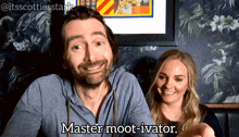 a man and a woman are sitting next to each other and the man is saying " master moot-ivator "