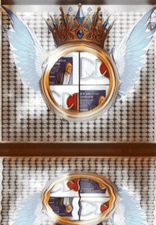 a picture of a crown with wings is displayed on a wall