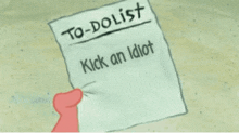 a cartoon hand is writing on a piece of paper that says to dolist kick an idiot