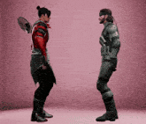 a video game character is standing next to another character