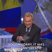a man in a suit and tie is smiling and saying oooh sorry , it was schwann sheath