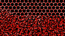a bunch of red and white balls are floating in the air on a black background .