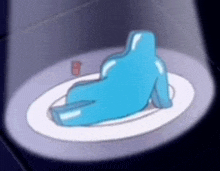 a blue object is sitting on a white plate