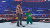 R-truth Hornswoggle GIF - R-truth Hornswoggle Wwe GIFs
