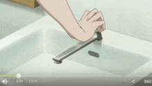 a video of a person washing their hands in a sink with a time of 3:31