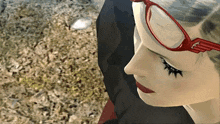 a close up of a woman 's face with red glasses on