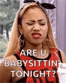 a woman is making a funny face and asking are u babysitting tonight ?