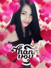a woman is surrounded by pink hearts with a thank you sticker