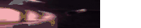a blurred image of a person standing on top of a table .