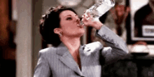 Karen Drinking GIF - Karen Walker Will And Grace Thirsty GIFs