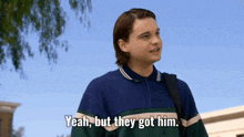 a young man says " yeah but they got him " while holding a backpack