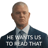 a man in a suit and tie with the words he wants us to read that