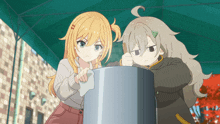 two anime girls are standing next to each other looking at a pot