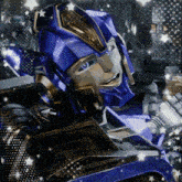 a close up of a blue and gold robot with stars behind it