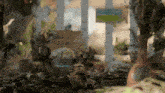a blurred image of a garden with a sign that says ' a few flowers ' on it