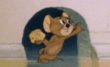 a cartoon mouse is holding a piece of cheese in its paws .