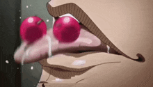 a close up of a person 's mouth with a cherry in it .