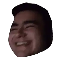 a close up of a man 's face with a smile on it