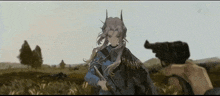a woman with horns is holding a gun in a field
