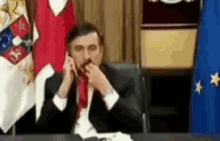 саакашвили галстук жует нервничает нервы что делать GIF - Saakashvili Nervous Necktie GIFs