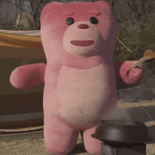 a pink teddy bear is standing next to a pot