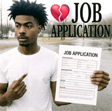 a man holds a job application in front of a broken heart