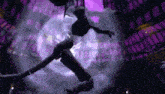 a silhouette of a person is flying through the air in a dark room .