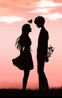 a silhouette of a man holding a bouquet of flowers and a woman with a heart on her head