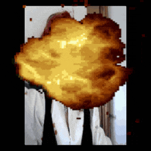 a pixel art of a person with a huge explosion behind their head