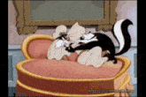 a cartoon of a cat and a skunk on a couch with justaplay stream.net in the corner