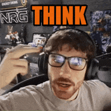 a man wearing glasses and headphones has the word think above him