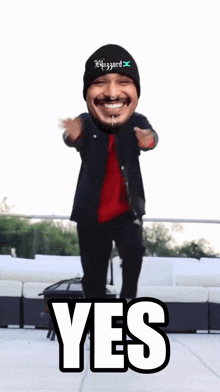 a man wearing a hat that says hazard on it is dancing
