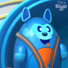 a blue and orange cartoon character with the word blippi in the background