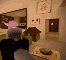 a man and a woman are sitting in a living room with a sign above them that says " heroom "