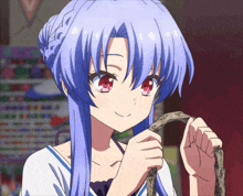 a girl with blue hair and red eyes holds a snake in her hand