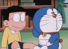 Doraemon Cat GIF - Doraemon Cat Laugh GIFs