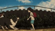 a boy with a red backpack stands next to a black and white dog