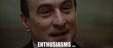 a close up of a man 's face with the words `` enthusiasms '' written on the bottom .