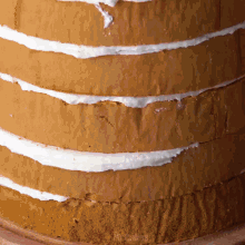 a close up of a cake with layers of frosting