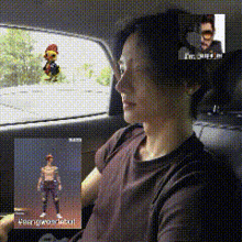 a man is sitting in the back seat of a car holding a picture of a man and a chicken .