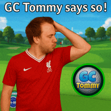 a man in a red liverpool shirt is scratching his head