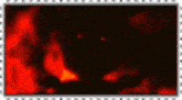 a picture of a fire in a frame with a white border .