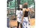 two women standing next to each other with one wearing a t-shirt that says ' i love you ' on it