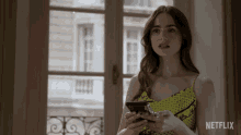 Confused Lily Collins GIF - Confused Lily Collins Emily Cooper GIFs