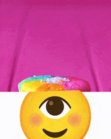 a yellow smiley face with a third eye and a pink background